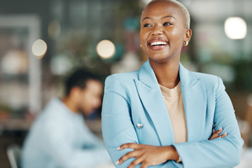 Woman in blue blazer jacket smiling