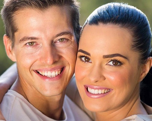 Couple with dentures smiling