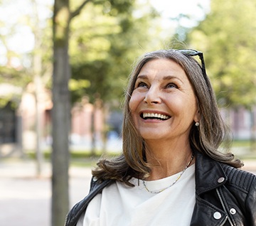Senior woman with sunglasses smiling