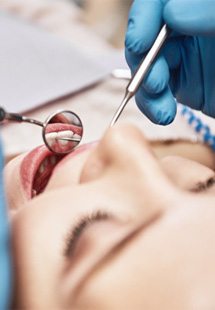 A dentist near North Tustin performing a dental checkup