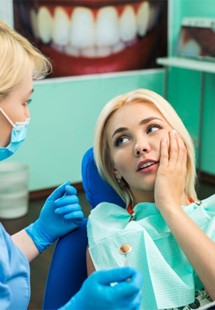 A dentist near North Tustin treating a dental emergency