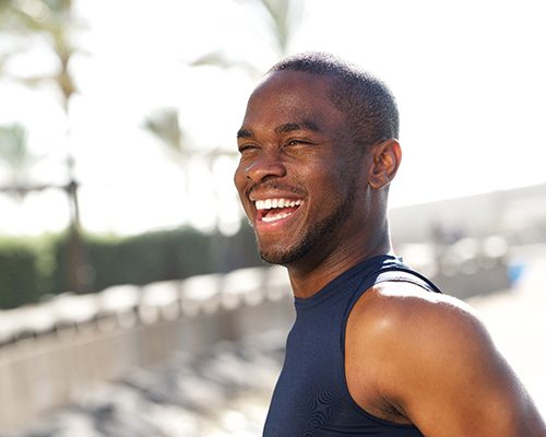 Man with veneers in Tustin smiling