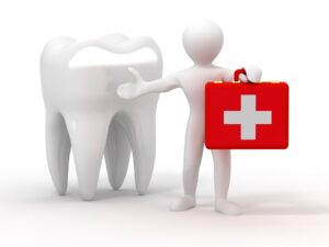Illustration of a large model tooth next to a humanoid figure holding a red emergency kit